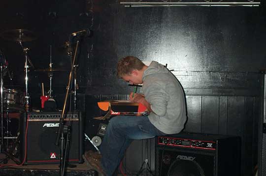 Ernie writing a set list before a show